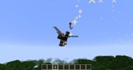 Flying with the help of Elytra and firework rockets (Image via Minecraft)
